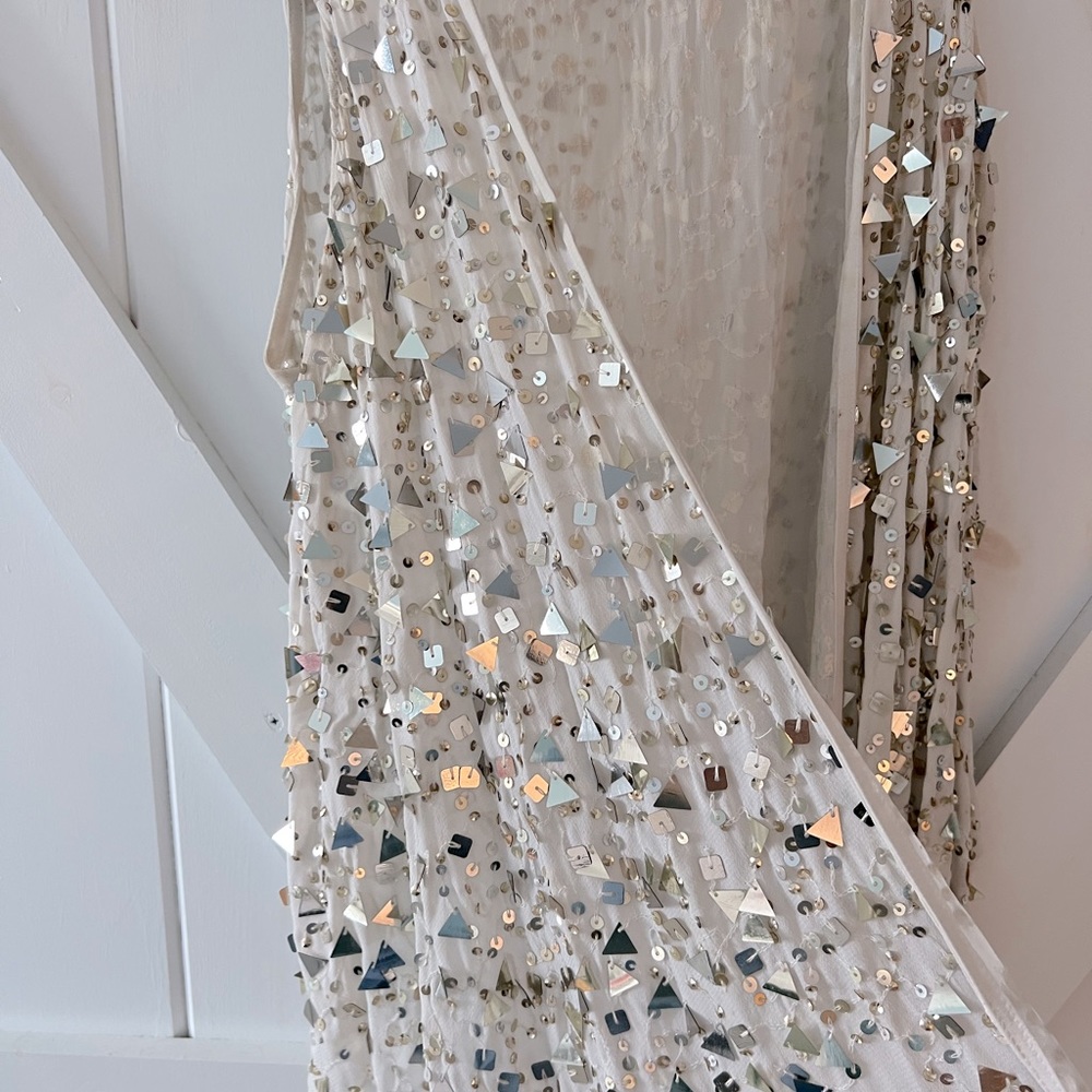 Sequined white vest